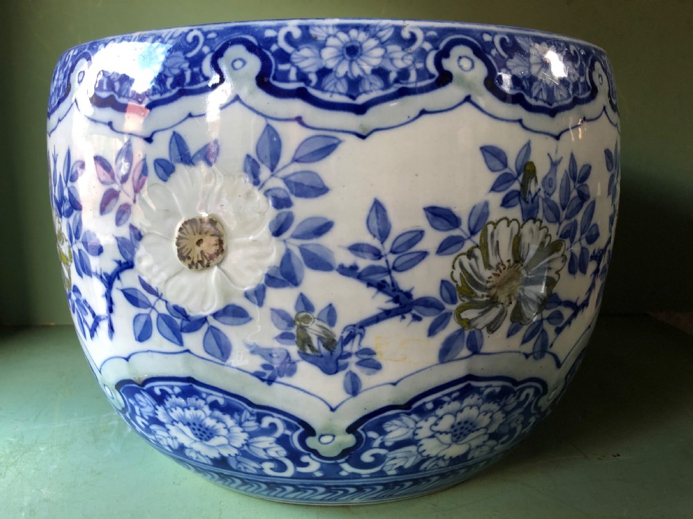 Large late C19th Japanese porcelain jardiniere or ‘fish-bowl’ with blue and white floral decoration. View V