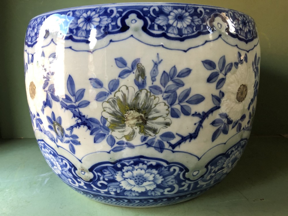 Large late C19th Japanese porcelain jardiniere or ‘fish-bowl’ with blue and white floral decoration. View X