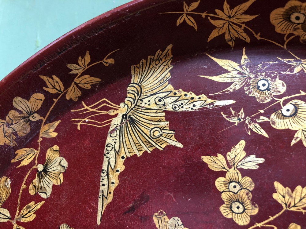 Early C19th Regency period maroon and gilt papier-mâché circular tray by Clay , London. View IV