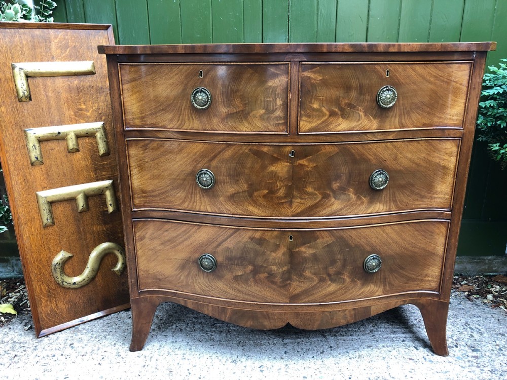 Early C19th Regency period mahogany serpentine-outline chest of drawers . View VI