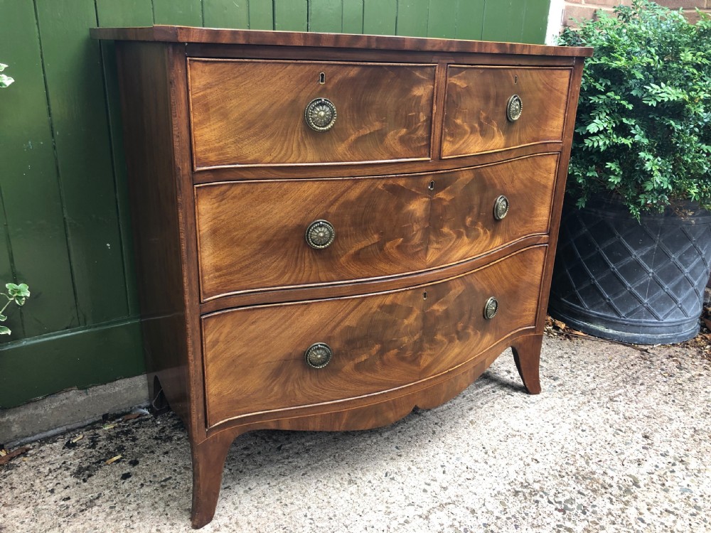 Early C19th Regency period mahogany serpentine-outline chest of drawers . View XIII