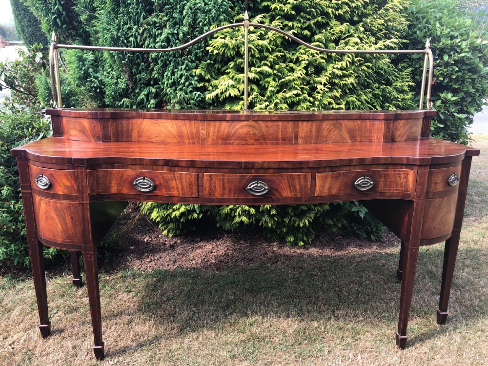 Late C18th George III period Scottish mahogany serpentine-front sideboard . View VIII