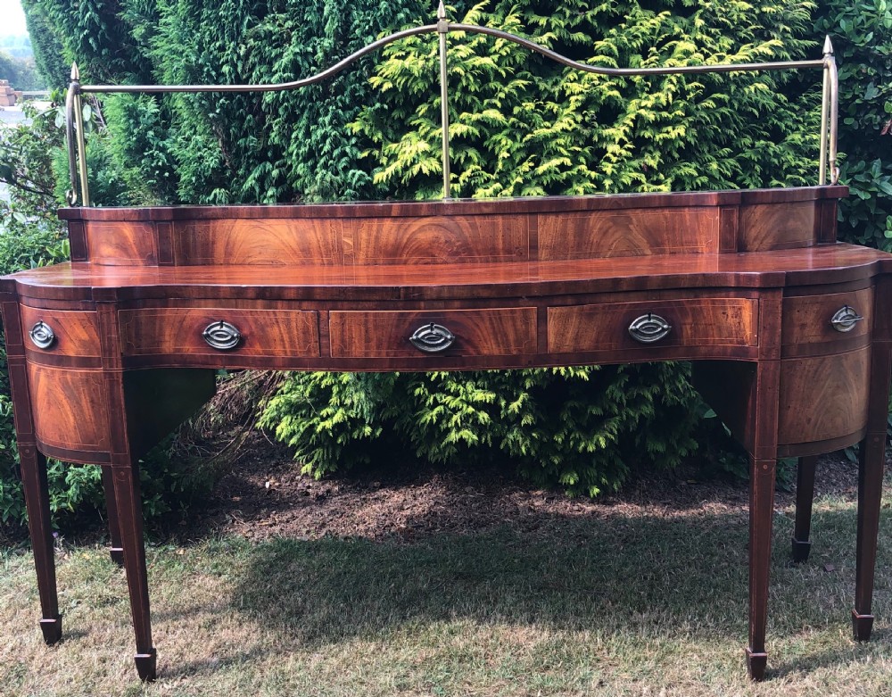 Late C18th George III period Scottish mahogany serpentine-front sideboard . View XIX