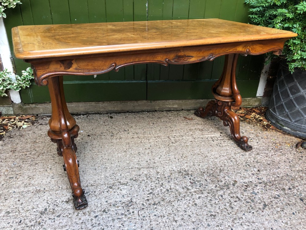 Mid C19th early Victorian period carved walnut centre or library table of free-standing form . View X