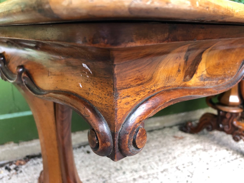 Mid C19th early Victorian period carved walnut centre or library table of free-standing form . View XI