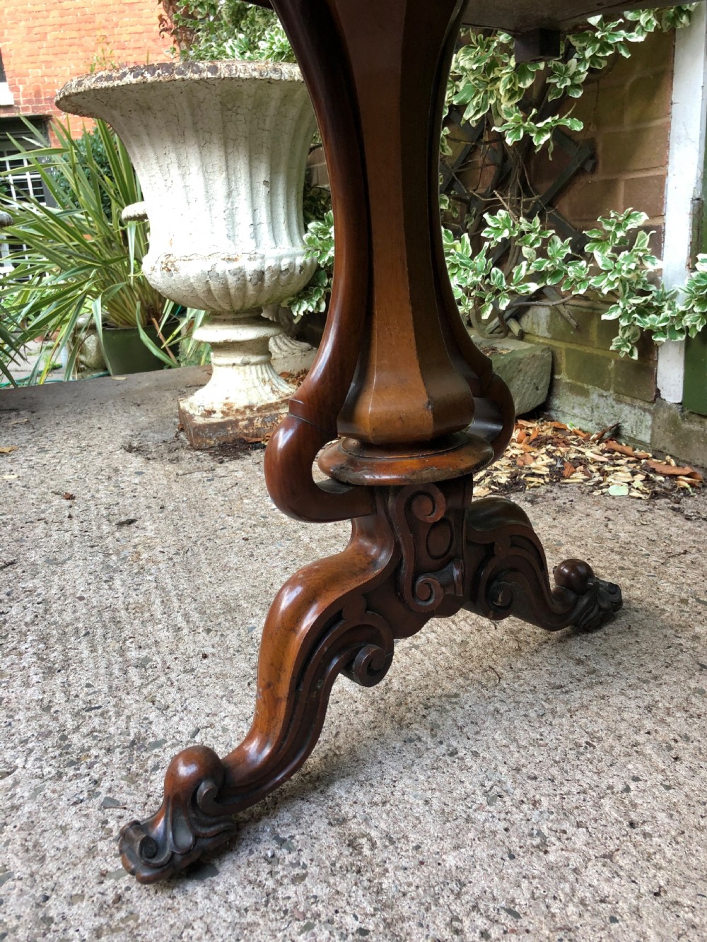 Mid C19th early Victorian period carved walnut centre or library table of free-standing form . View XIII