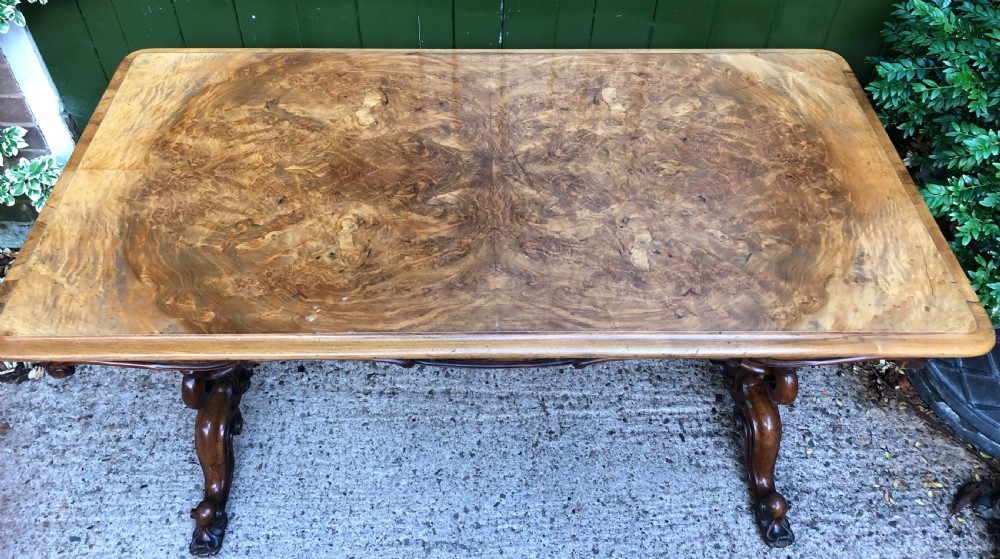 Mid C19th early Victorian period carved walnut centre or library table of free-standing form . View XV