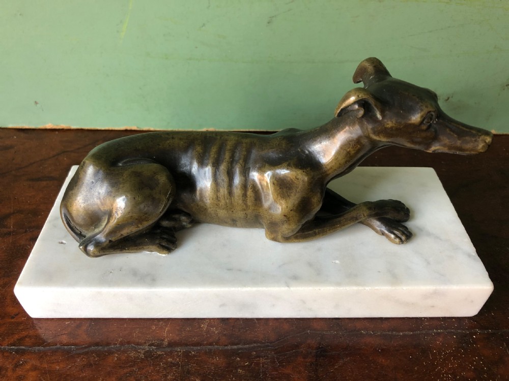 C19th Regency period bronze greyhound or whippet on carrara marble block base. View II