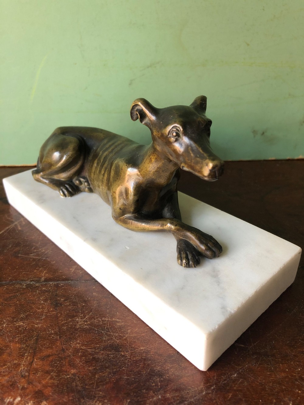 C19th Regency period bronze greyhound or whippet on carrara marble block base. View IX