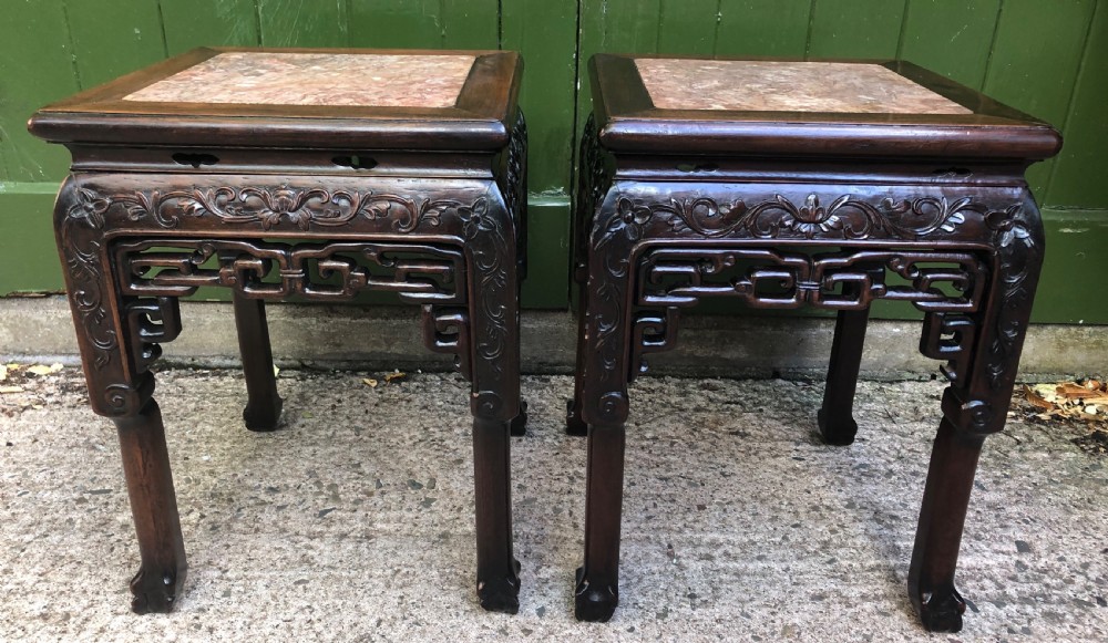 Pair of late C19th Chinese Qing Dynasty carved hardwood low jardiniere stands .