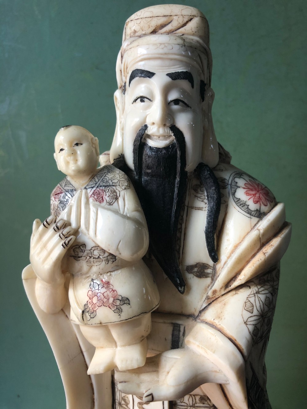 Early C20th Japanese carved bone ‘okimono’ figure of an immortal or sage. View VI