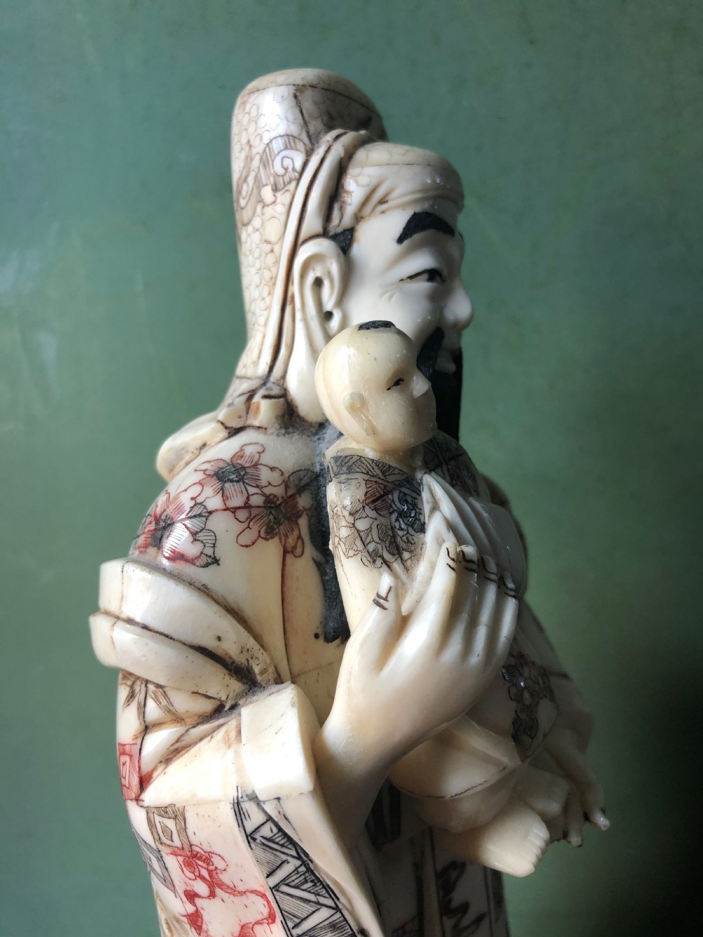 Early C20th Japanese carved bone ‘okimono’ figure of an immortal or sage. View VIII