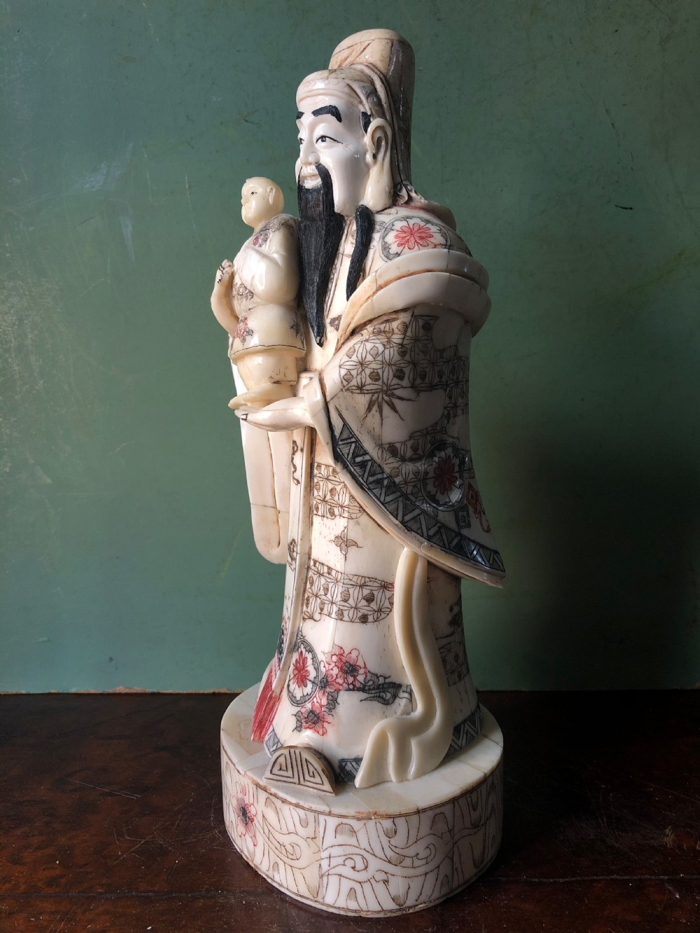 Early C20th Japanese carved bone ‘okimono’ figure of an immortal or sage. View IX