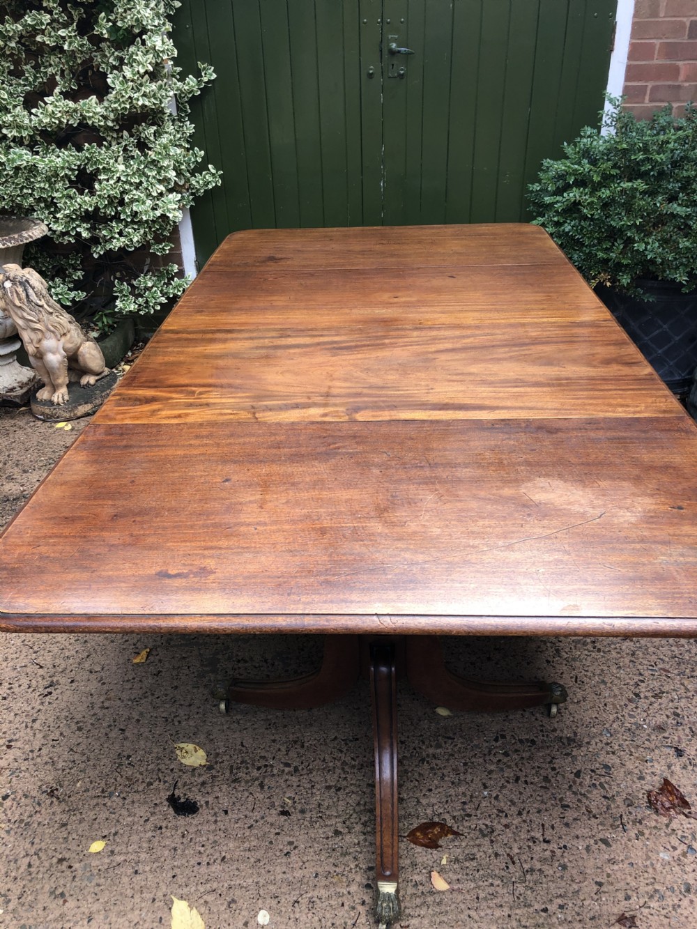Fine early C19th Regency period mahogany twin-pillar dining table. View VIII
