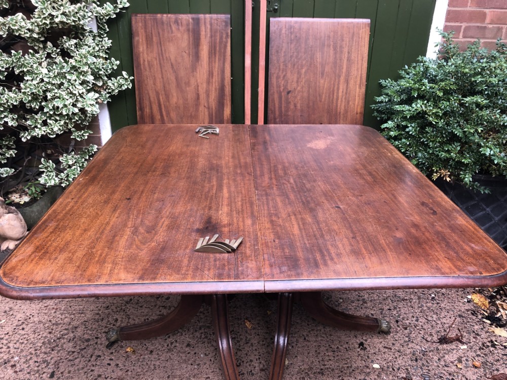 Fine early C19th Regency period mahogany twin-pillar dining table. View IX