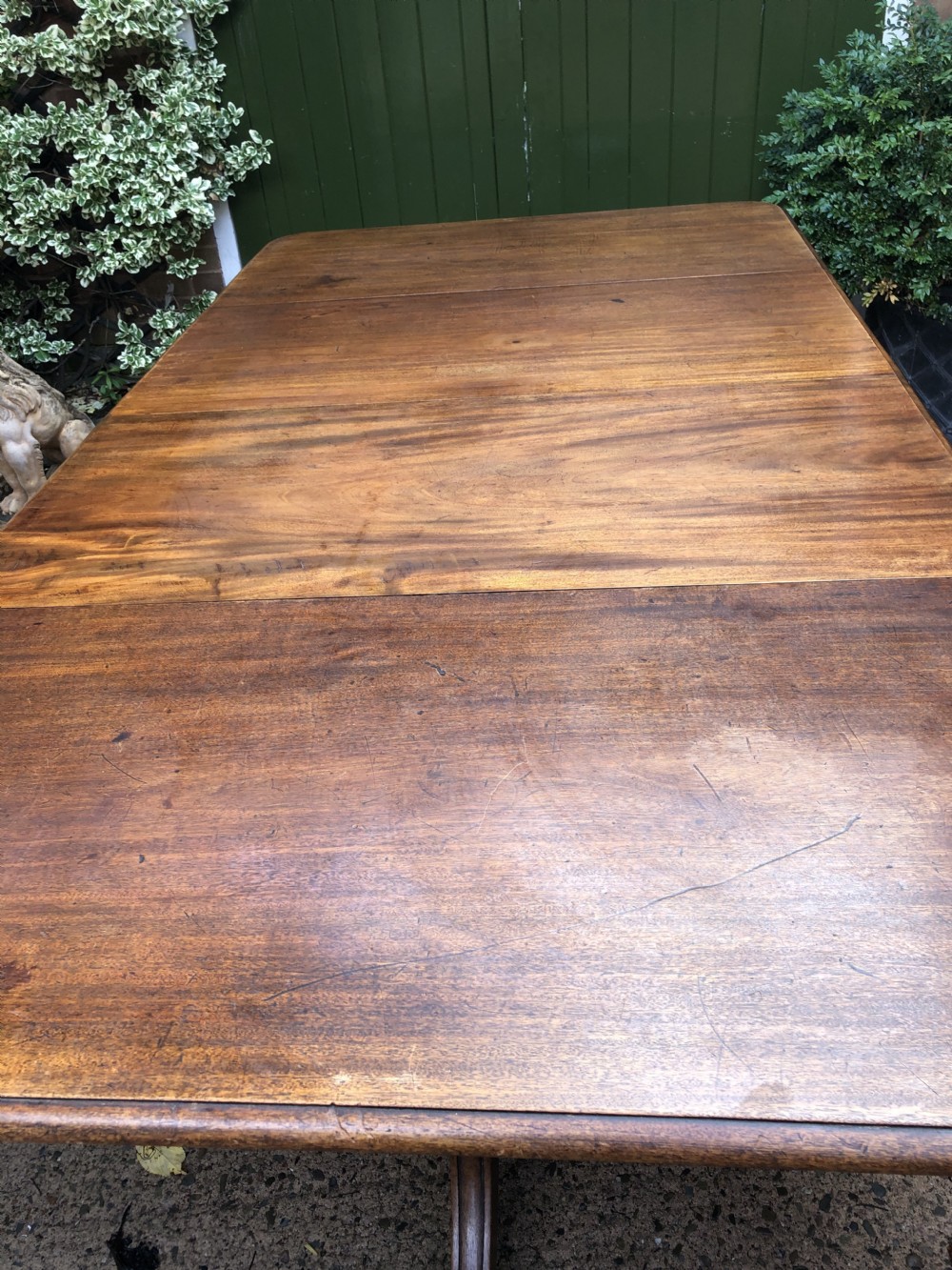 Fine early C19th Regency period mahogany twin-pillar dining table. View XVII