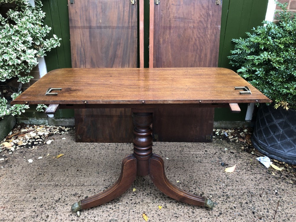 Fine early C19th Regency period mahogany twin-pillar dining table. View XXII