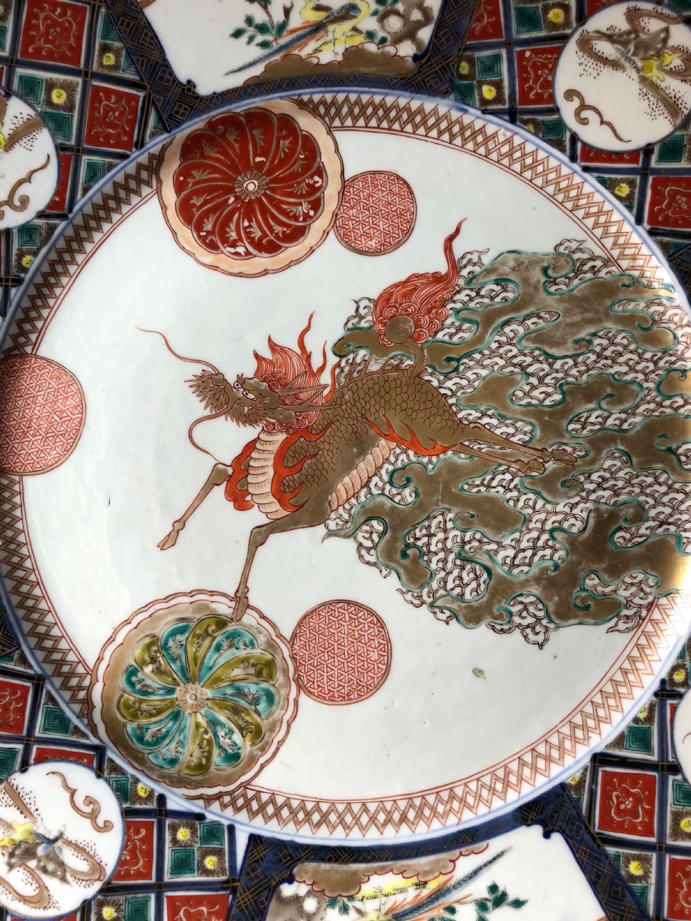 Late C19th Japanese Meiji period porcelain charger decorated in the Imari palette. View XIX