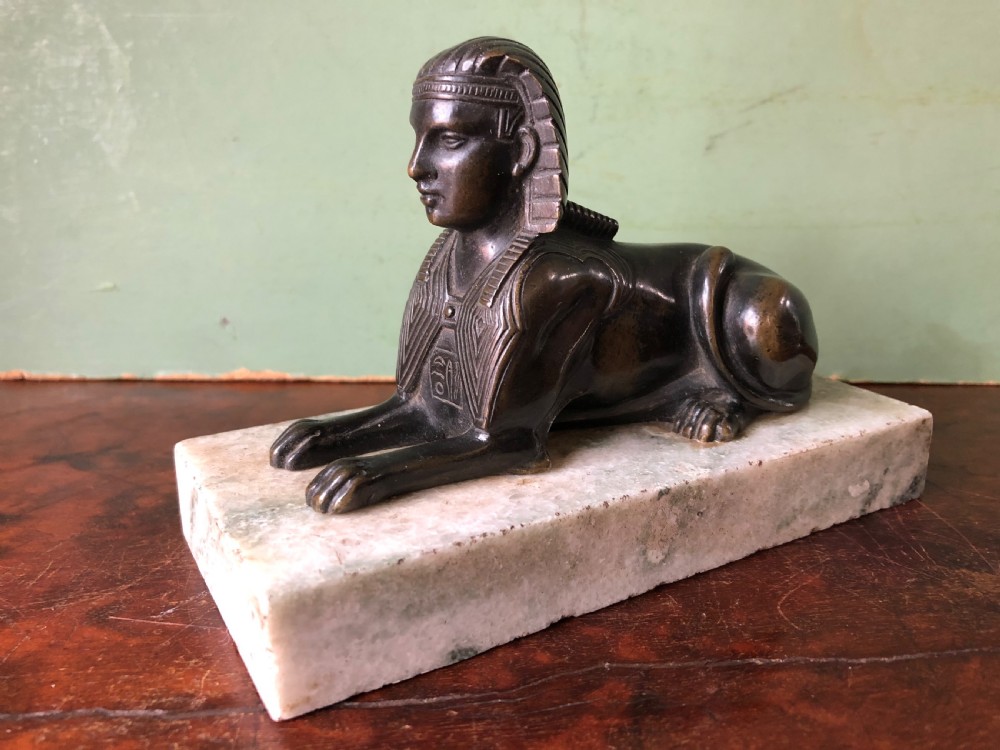Early C19th bronze sculpture study of a Sphinx mounted on a ‘verde mare’ marble base. View III