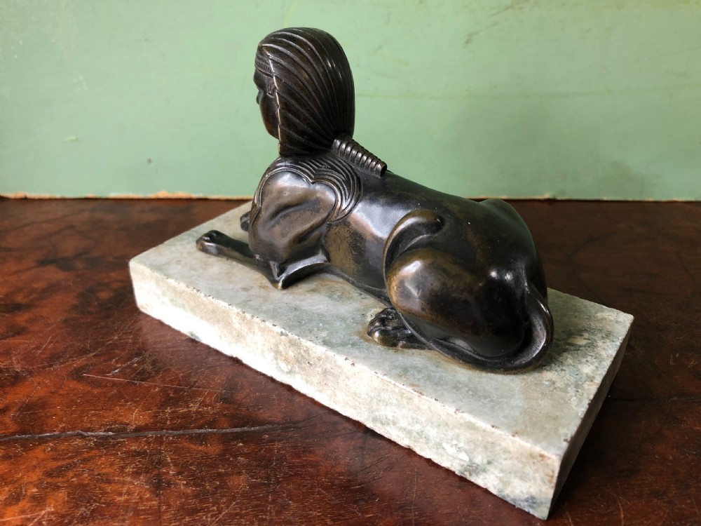 Early C19th bronze sculpture study of a Sphinx mounted on a ‘verde mare’ marble base. View IV