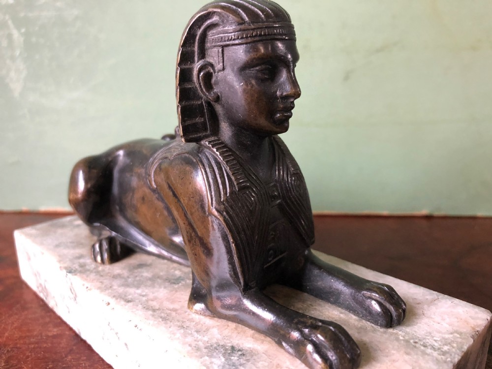 Early C19th bronze sculpture study of a Sphinx mounted on a ‘verde mare’ marble base. View IX