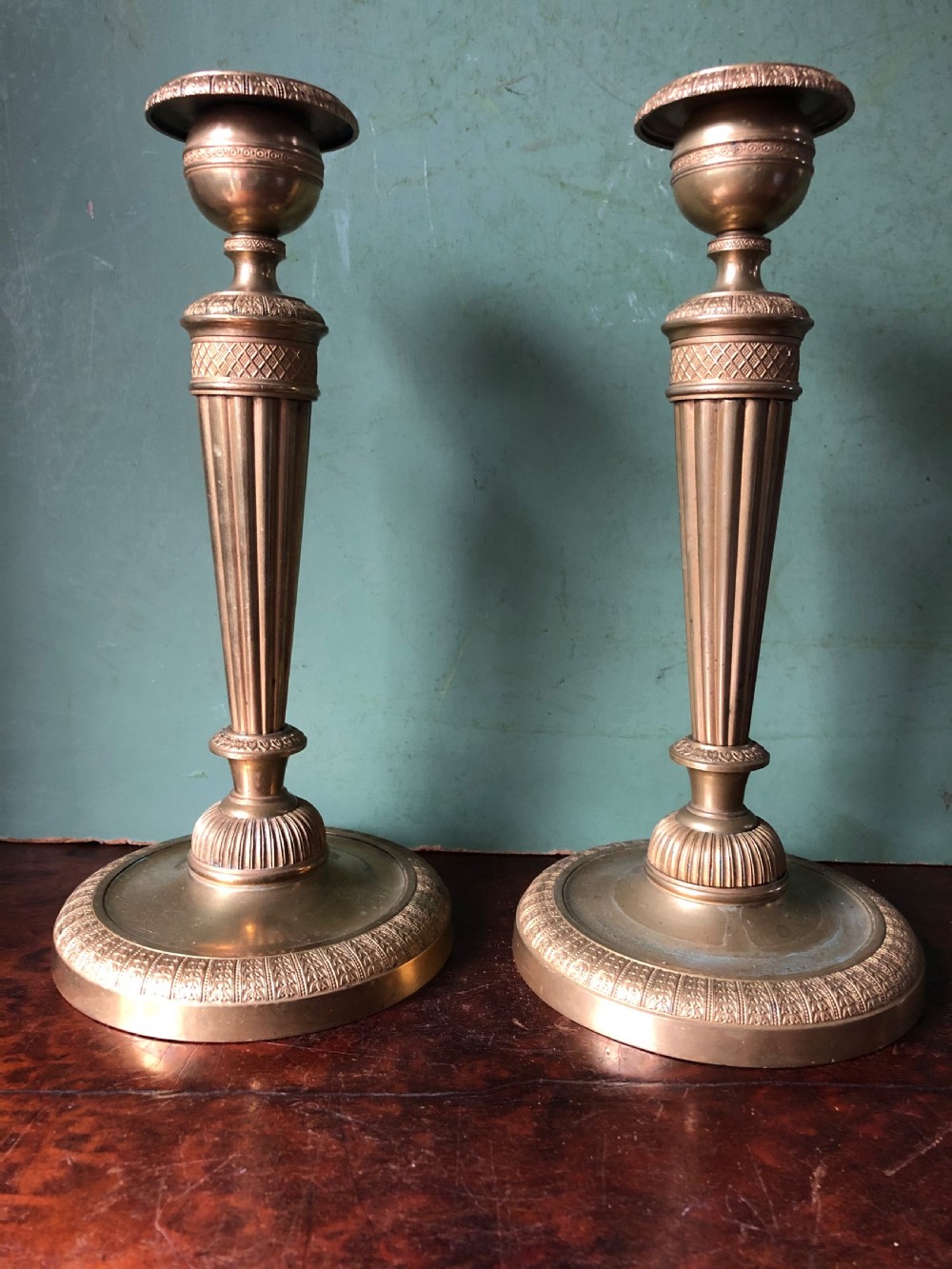 Pair of early C19th French Charles X period ormolu bronze candlesticks .