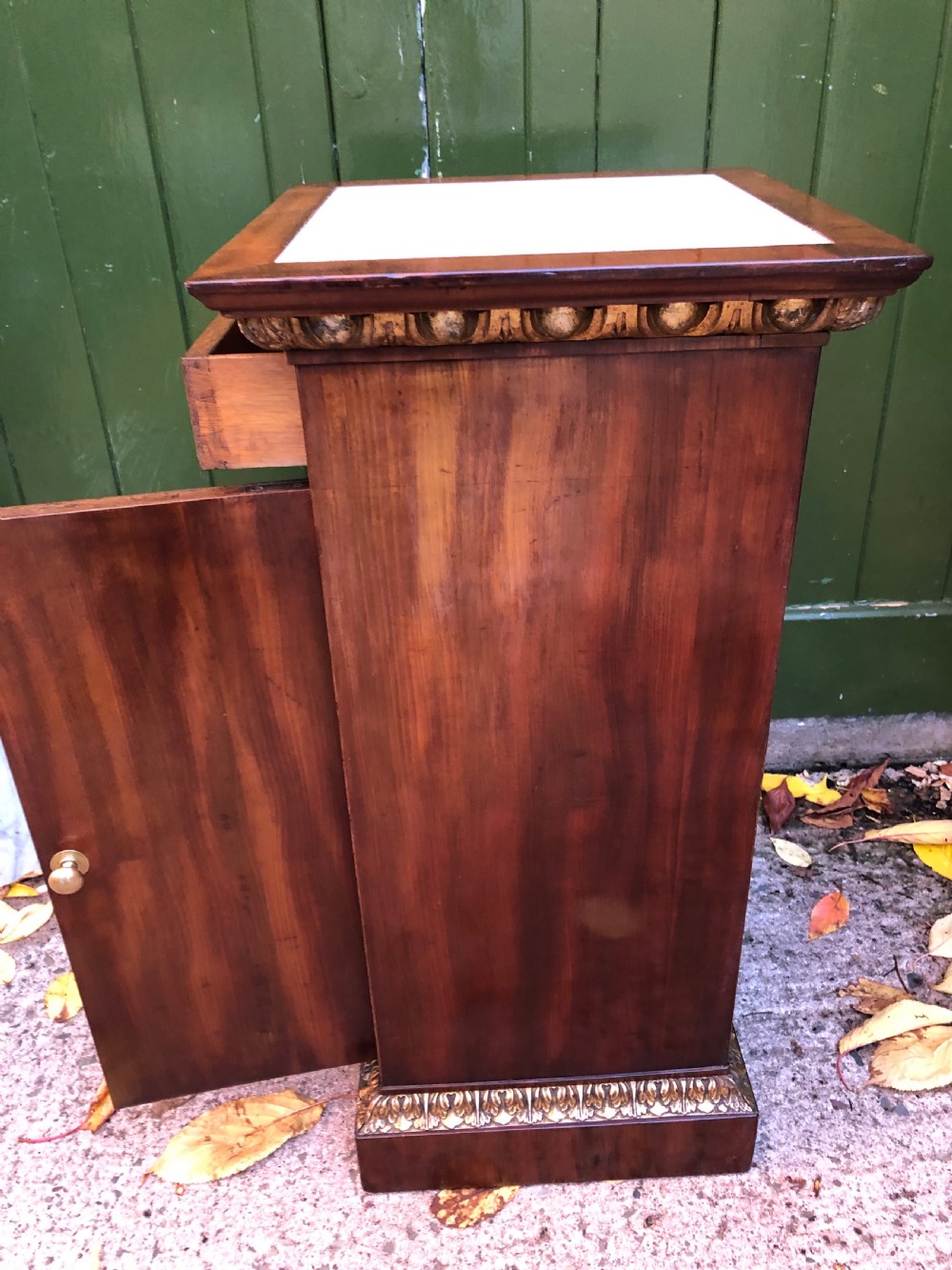 Early C19th Italian mahogany and carved parcel-gilt marble-topped pedestal bedside  cupboard. View XI