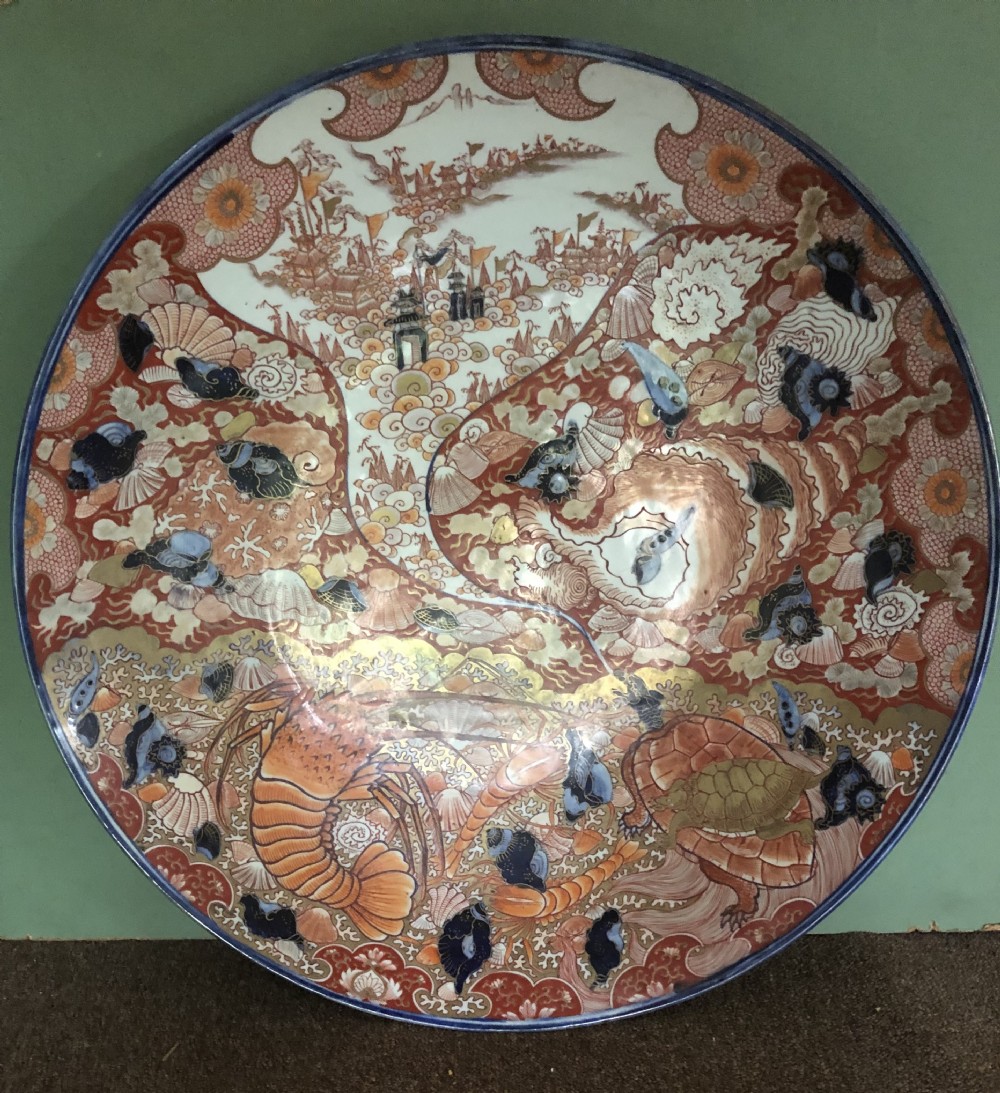 Fine large late C19th Japanese Meiji period porcelain charger in the Imari palette . View VI