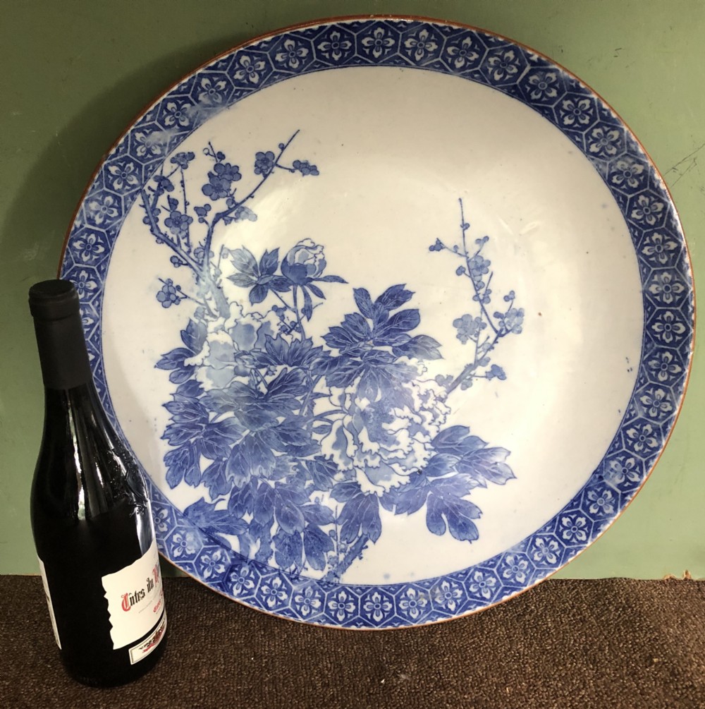Late C19th Japanese Meiji period Arita porcelain charger with blue and white floral decoration. View VIII