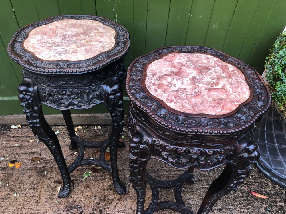 Large-scale matched pair of late C19th Chinese Qing Dynasty carved hardwood urn stands . View IV