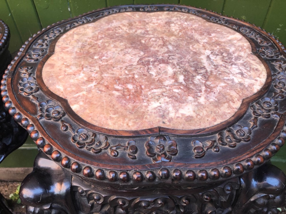 Large-scale matched pair of late C19th Chinese Qing Dynasty carved hardwood urn stands . View VII