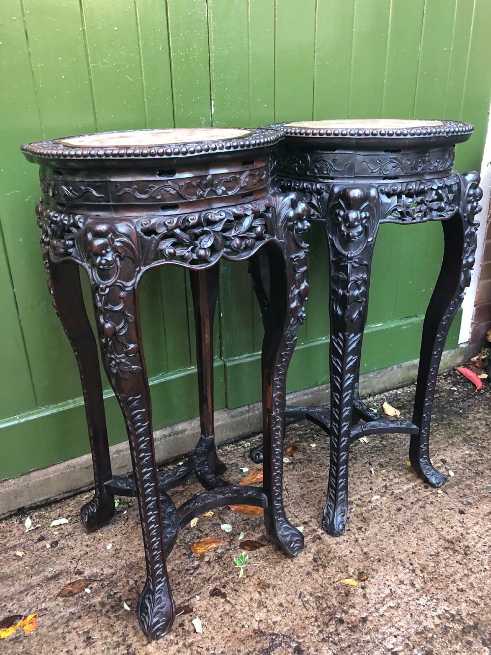 Large-scale matched pair of late C19th Chinese Qing Dynasty carved hardwood urn stands . View XI