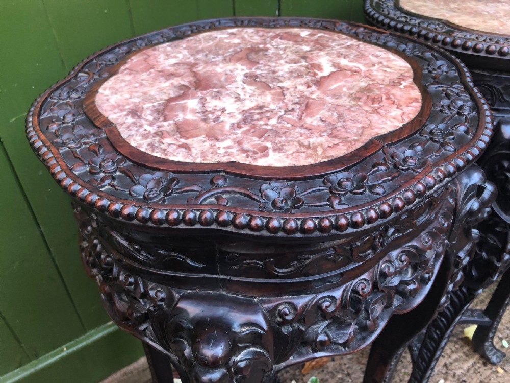 Large-scale matched pair of late C19th Chinese Qing Dynasty carved hardwood urn stands . View XII
