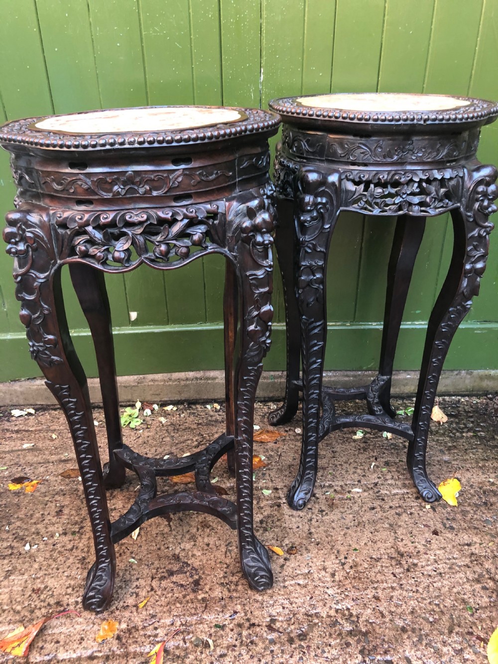 Large-scale matched pair of late C19th Chinese Qing Dynasty carved hardwood urn stands . View XIV