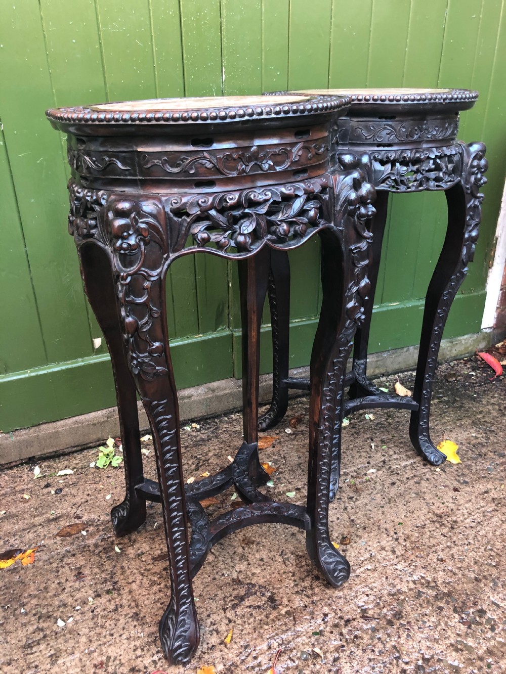 Large-scale matched pair of late C19th Chinese Qing Dynasty carved hardwood urn stands . View XVI