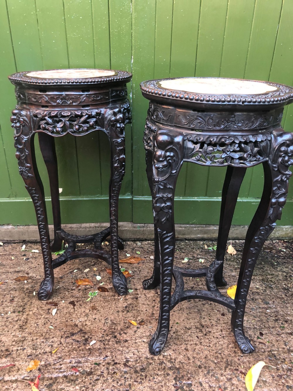 Large-scale matched pair of late C19th Chinese Qing Dynasty carved hardwood urn stands . View XVII