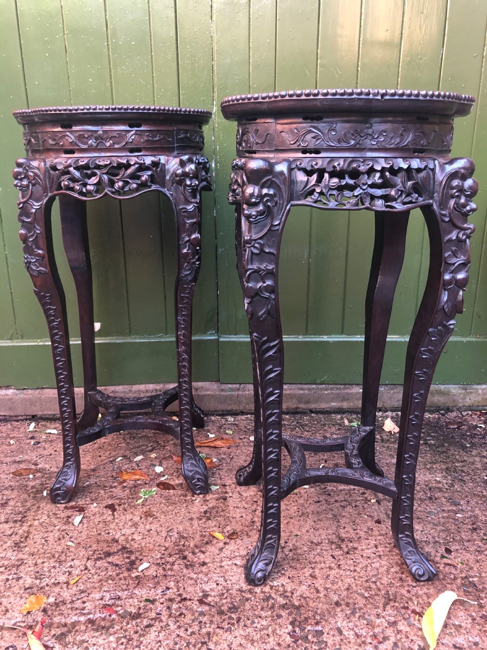 Large-scale matched pair of late C19th Chinese Qing Dynasty carved hardwood urn stands . View XIX