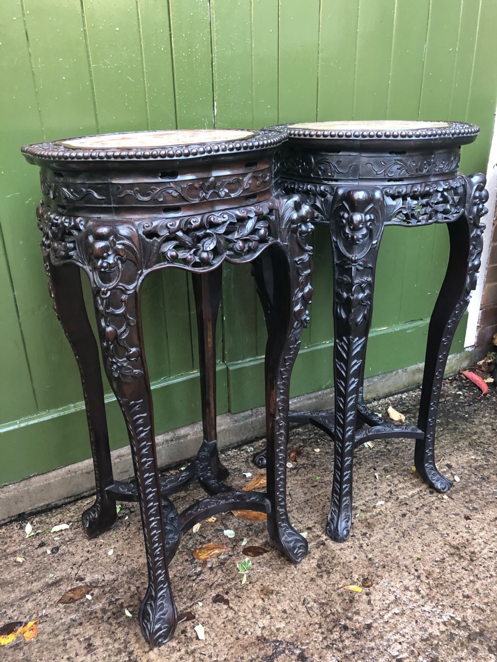 Large-scale matched pair of late C19th Chinese Qing Dynasty carved hardwood urn stands . View XXIII