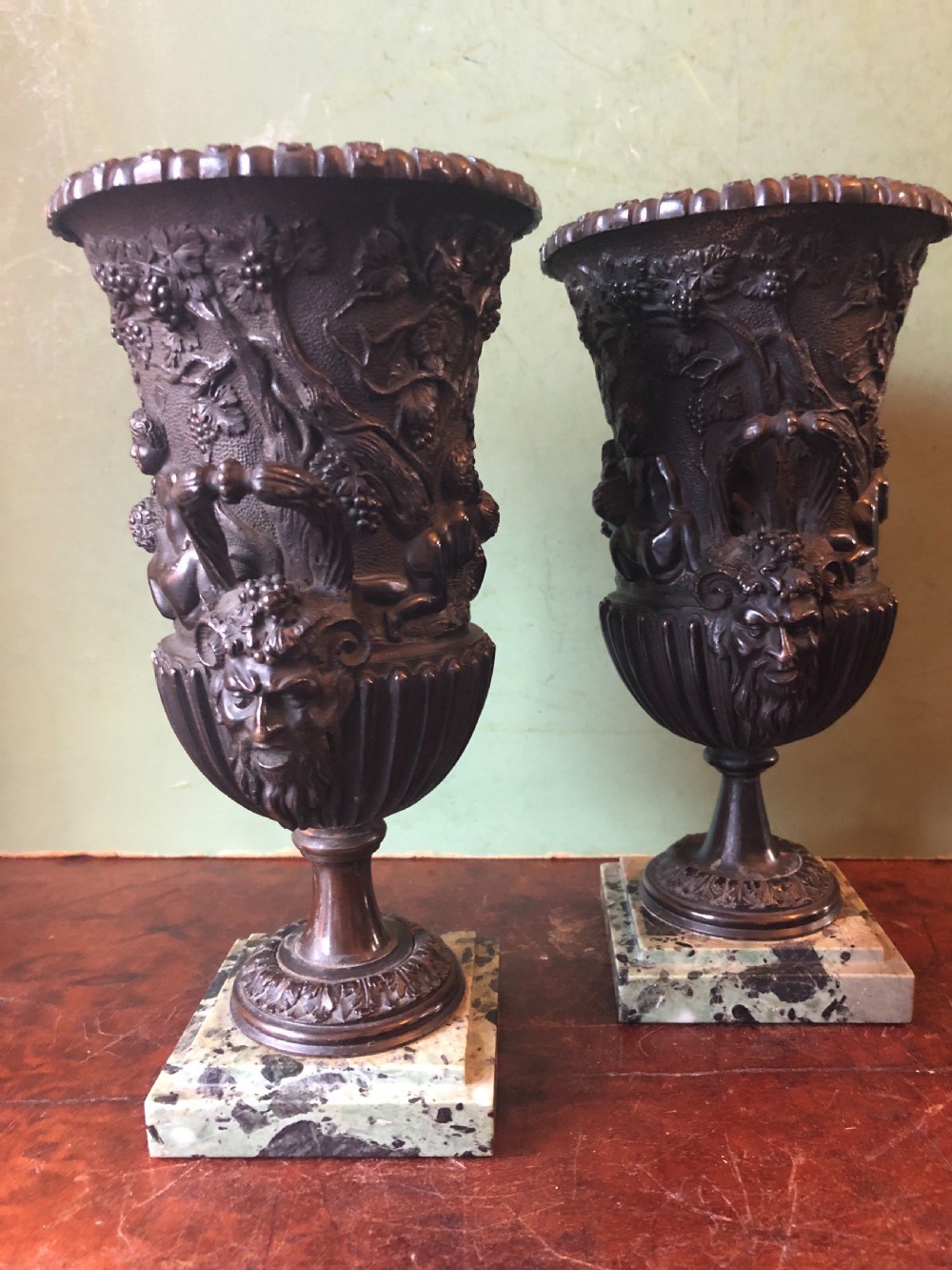Pair of mid C19th Italian classical design bronze vases decorated with Bacchanalian scenes . View III