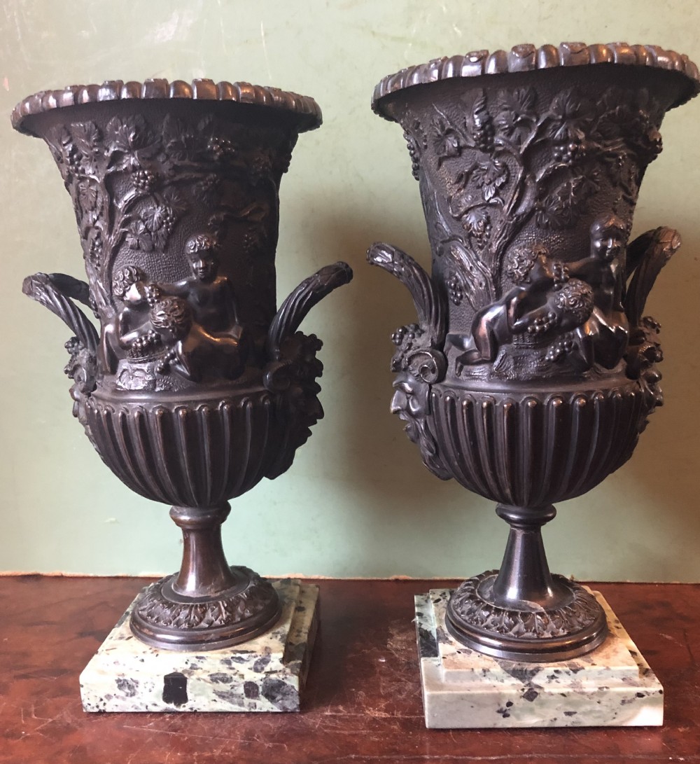 Pair of mid C19th Italian classical design bronze vases decorated with Bacchanalian scenes . View II