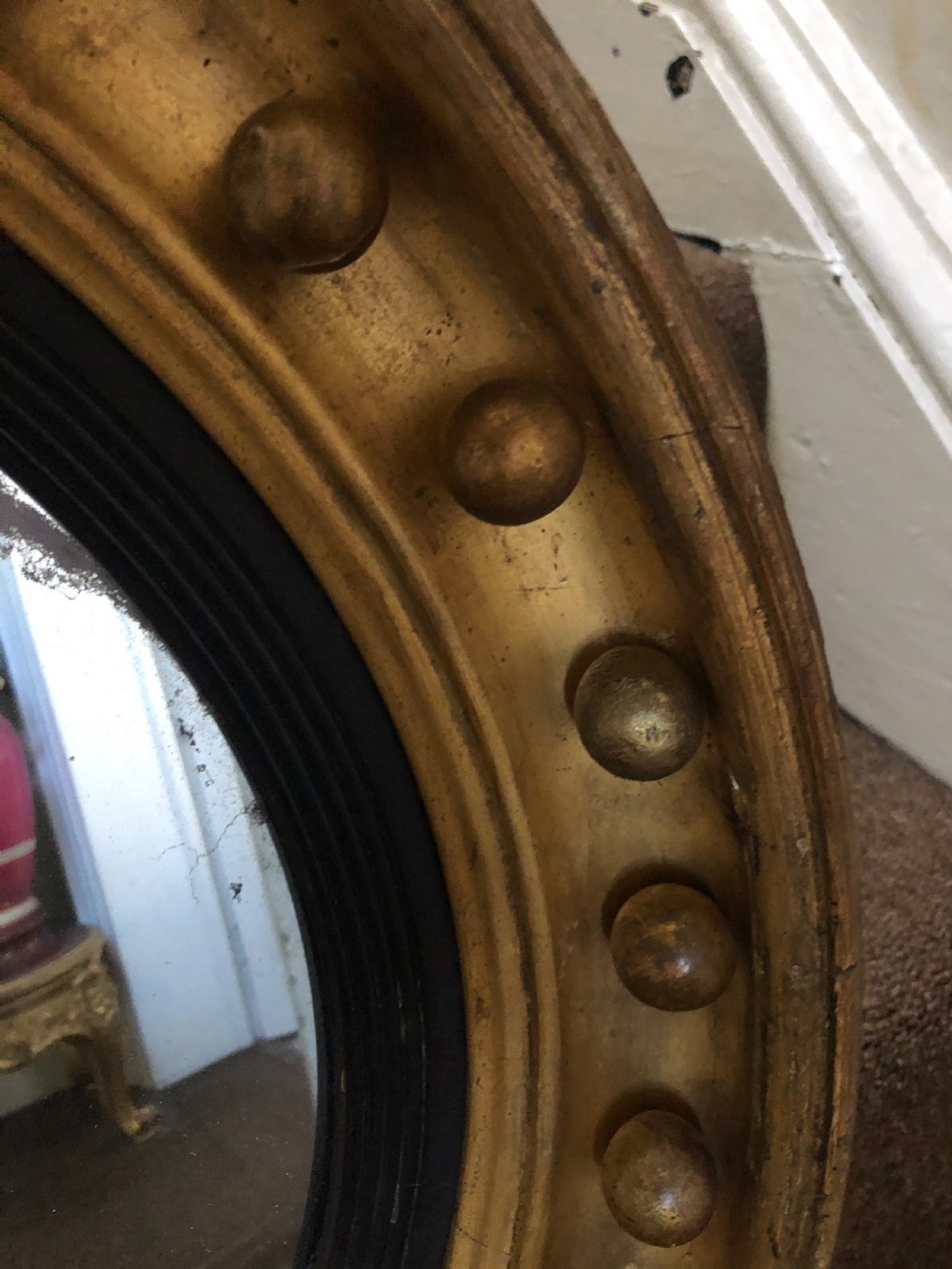 Early C19th Regency period gilt-wood framed convex mirror. View V
