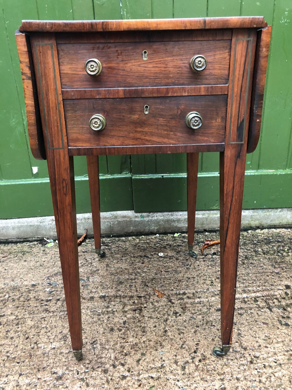 Early C19th late George III period rosewood drop-leaf sewing or work table . View III
