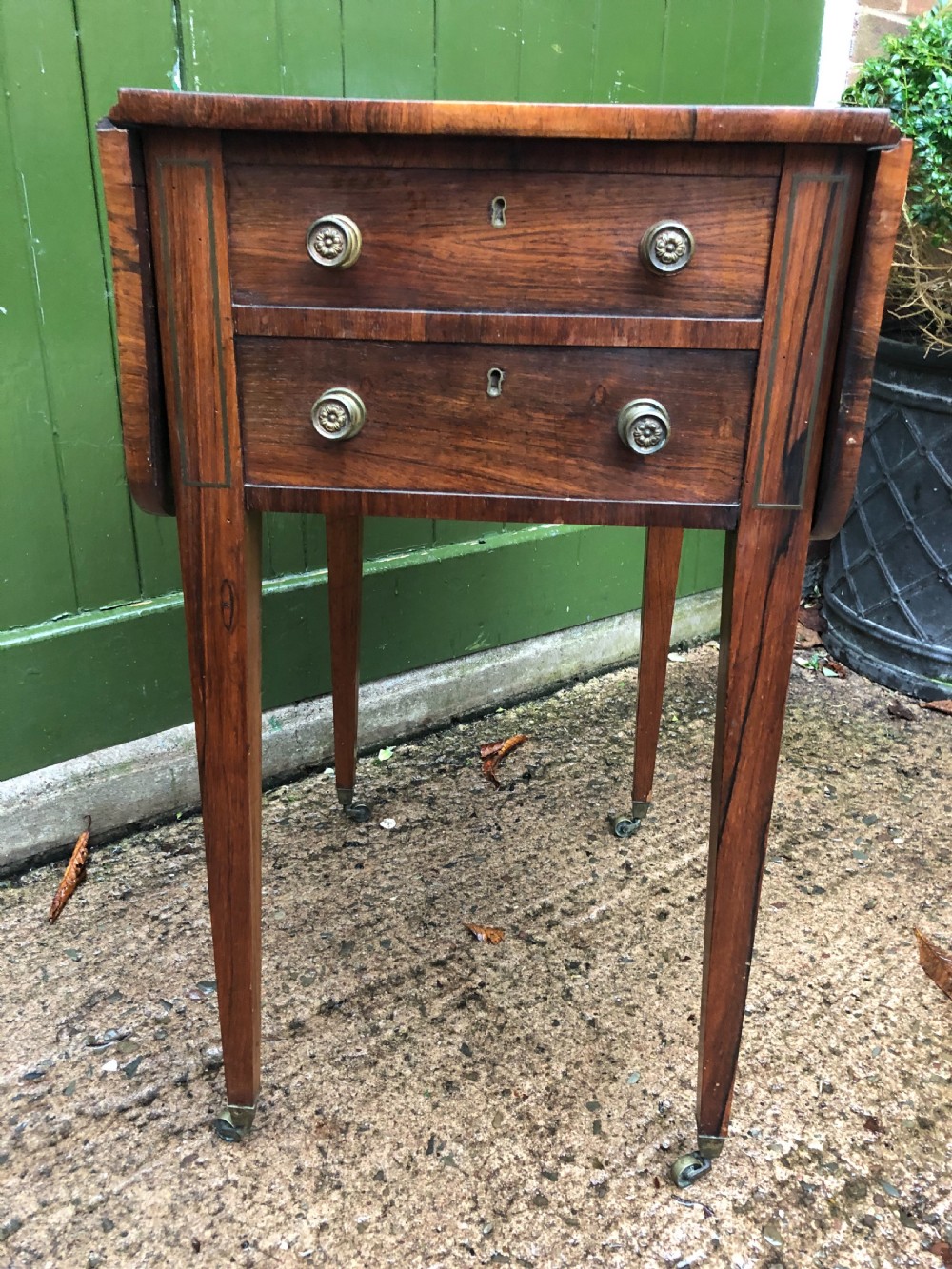 Early C19th late George III period rosewood drop-leaf sewing or work table . View V