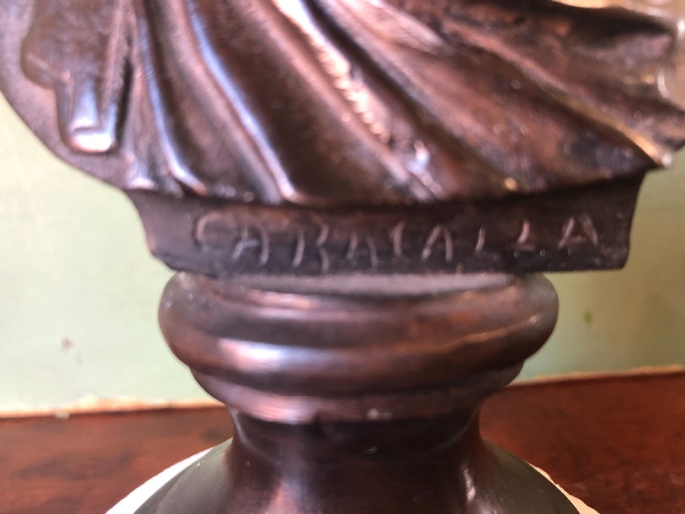 Pair of C19th Italian bronze ‘Grand Tour’ souvenir bust studies of the Roman Emperors Caracalla and Julius Caesar . View IV