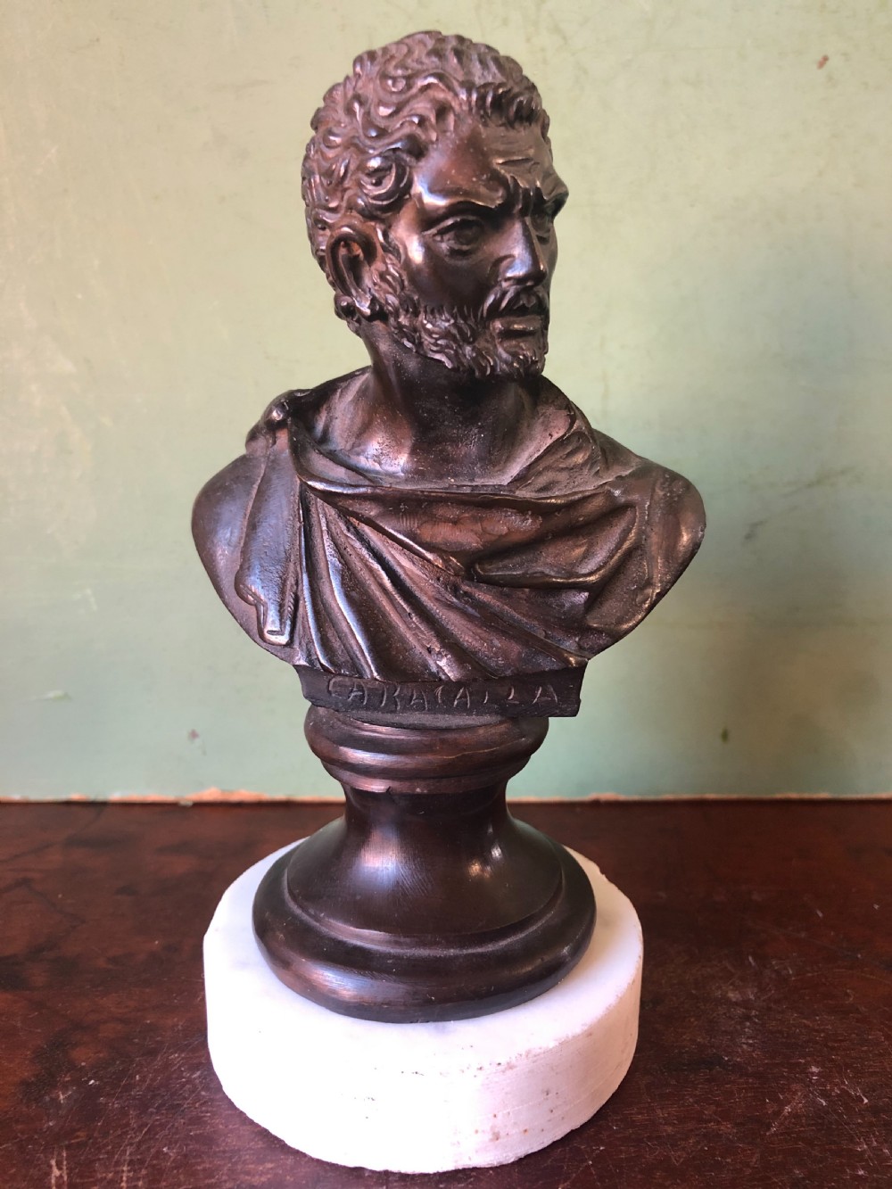 Pair of C19th Italian bronze ‘Grand Tour’ souvenir bust studies of the Roman Emperors Caracalla and Julius Caesar . View V