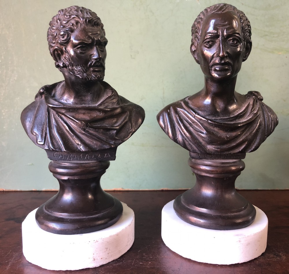 Pair of C19th Italian bronze ‘Grand Tour’ souvenir bust studies of the Roman Emperors Caracalla and Julius Caesar .