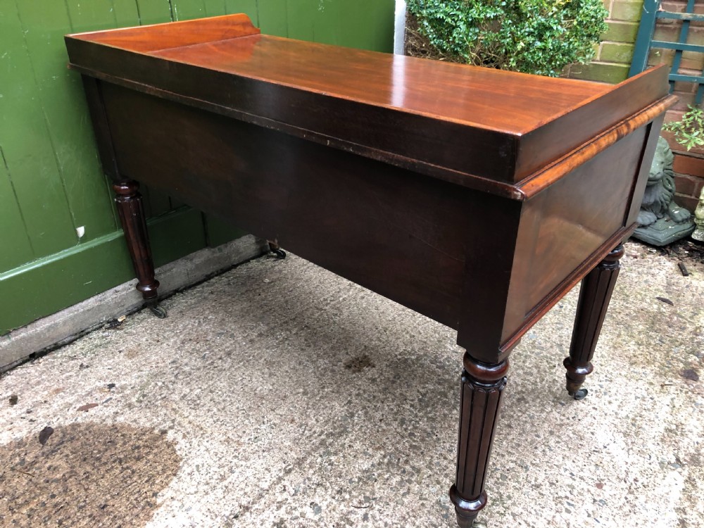 Early C19th George IV period mahogany kneehole writing table in the manner of Gillows of Lancaster and London. View VI