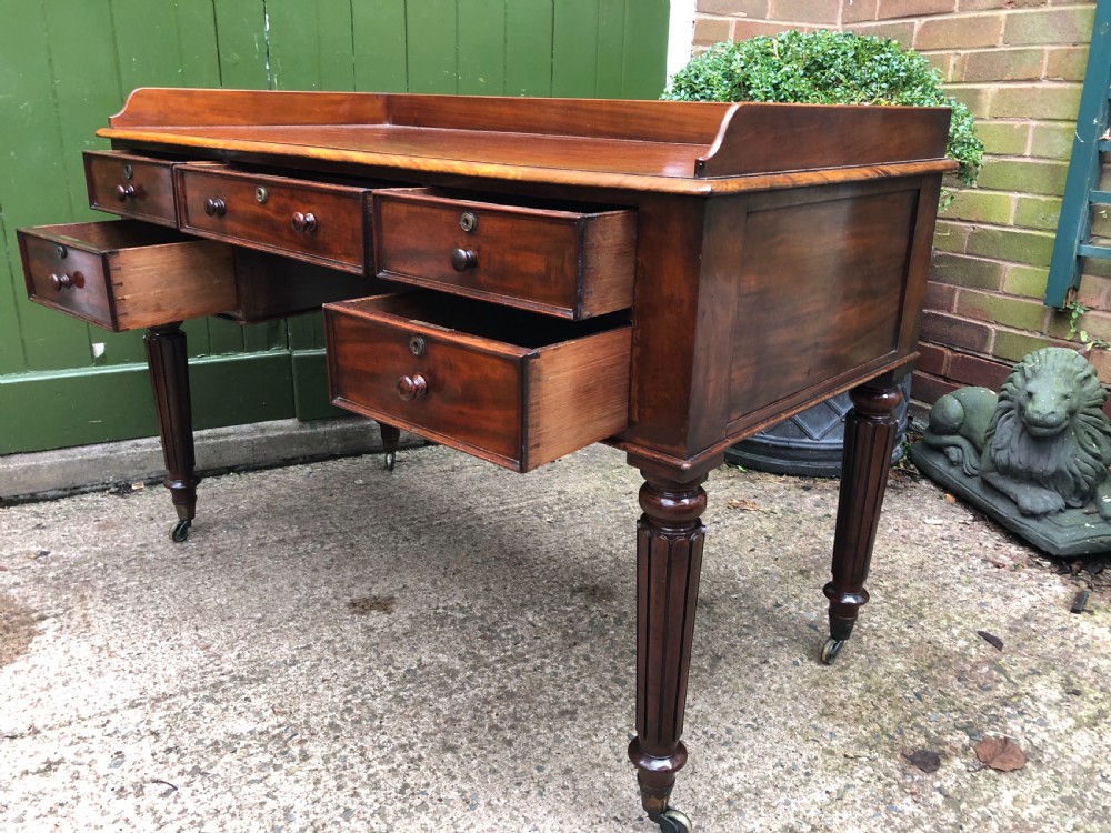 Early C19th George IV period mahogany kneehole writing table in the manner of Gillows of Lancaster and London. View IX