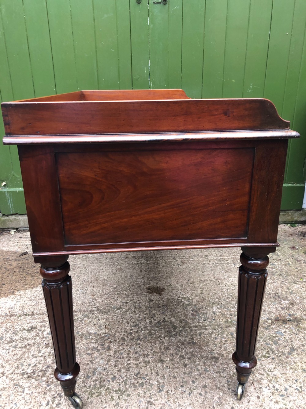 Early C19th George IV period mahogany kneehole writing table in the manner of Gillows of Lancaster and London. View XVI