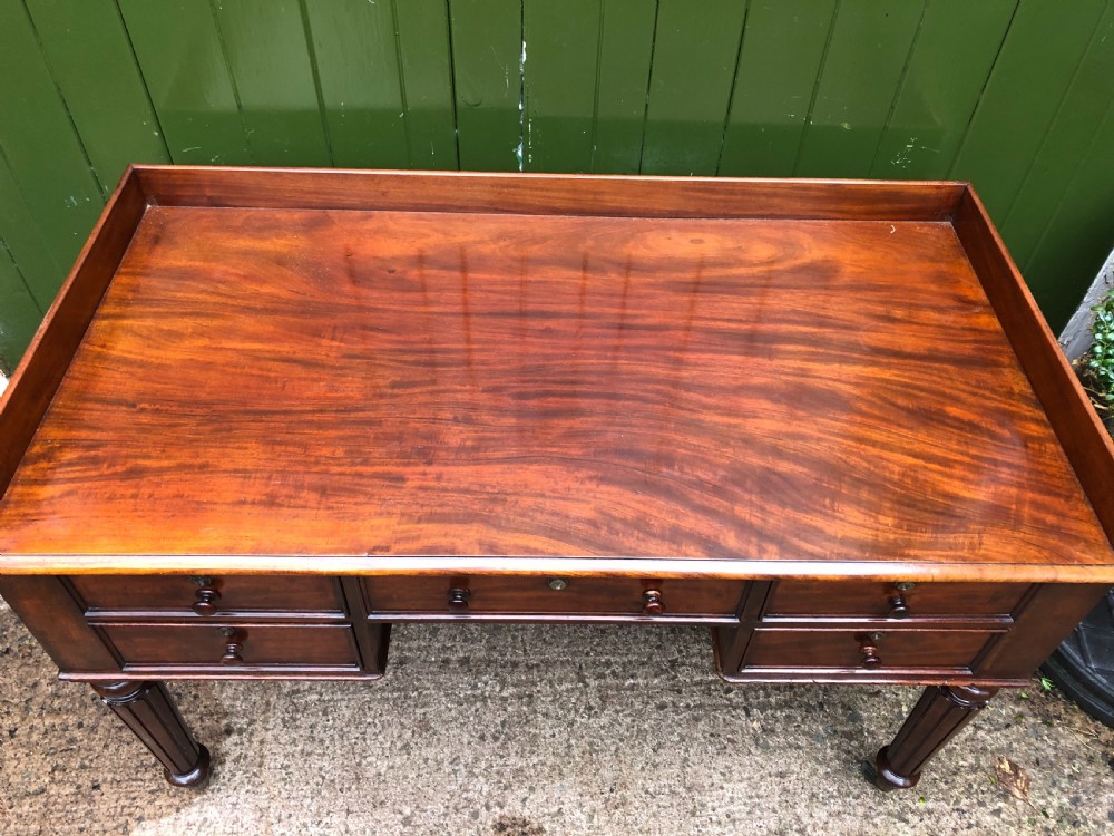 Early C19th George IV period mahogany kneehole writing table in the manner of Gillows of Lancaster and London. View XX